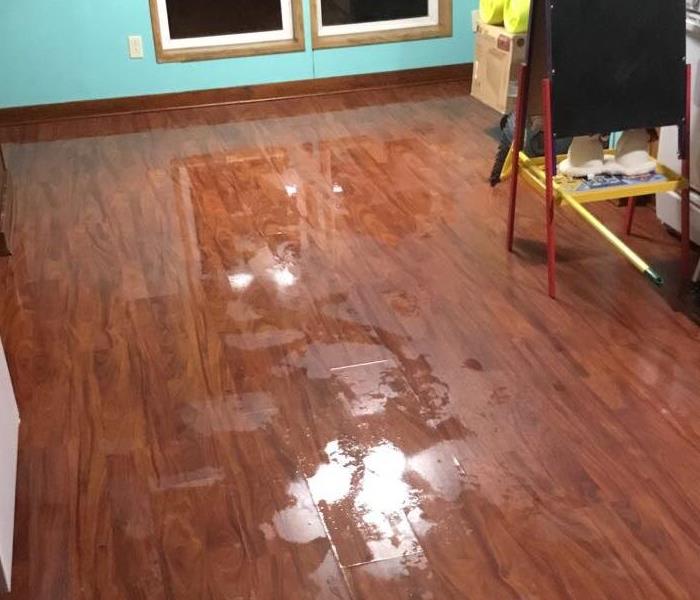 Water fills customers living room after a pipe burst